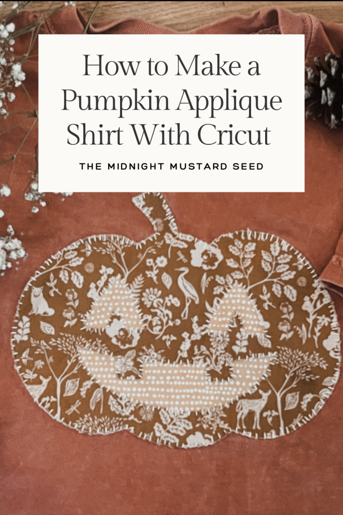 How to make a pumpkin applique shirt with cricut. Rust colored t shirt with an appliquéd Jack o lantern on it 