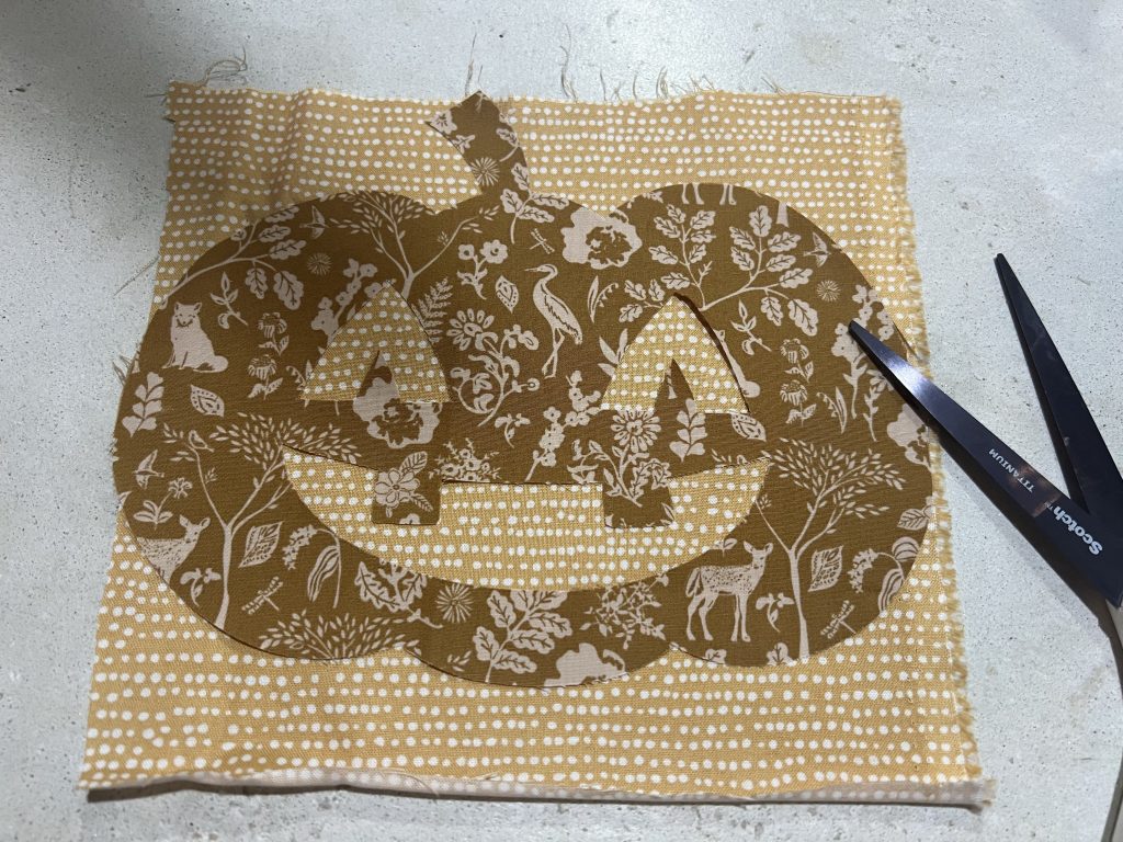 Fabric Jack o lantern shape cut out with Cricut maker 