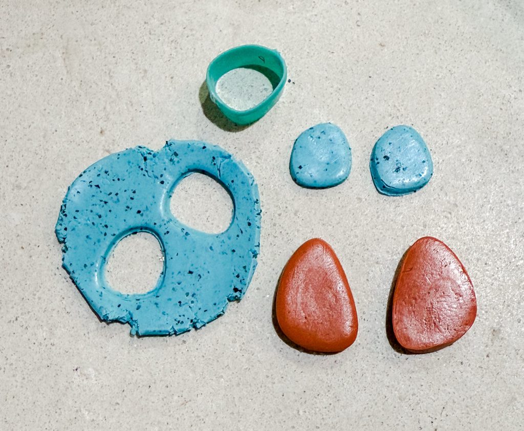 Turquoise and terracotta polymer clay cut out with clay cutters to make earrings