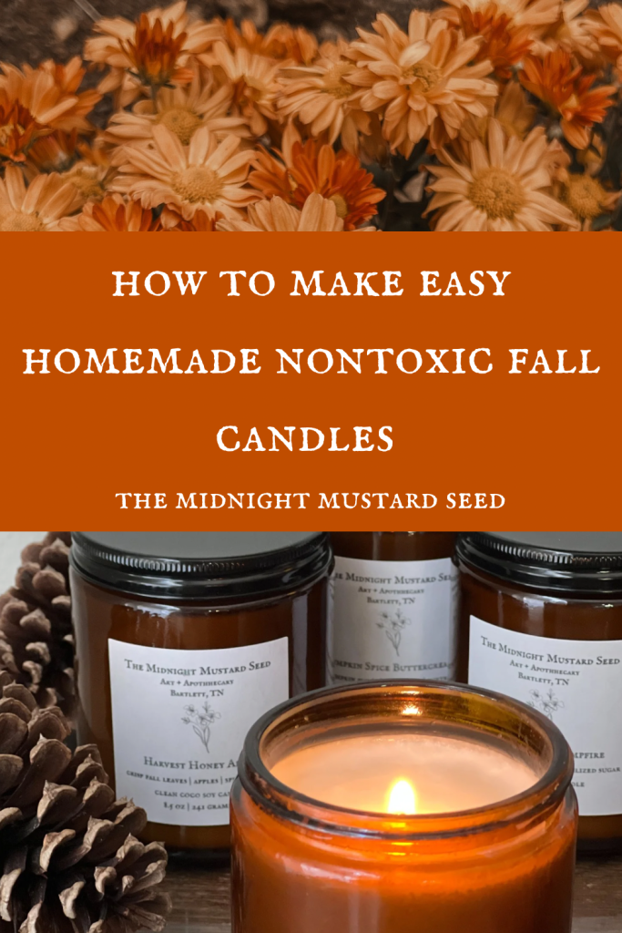 DIY nontoxic fall candles from The Midnight Mustard Seed blog and store, featuring amber jars with labels like Harvest Honey Apple and Pumpkin Spice Buttercream, surrounded by pinecones and autumn flowers, perfect for cozy home decor