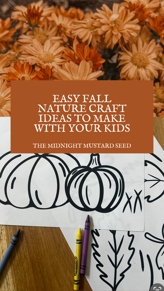 A vibrant blog post cover for www.themidnightmustardseed.com featuring a cozy fall theme. The image shows a background of warm orange chrysanthemum flowers, with a central orange panel displaying bold white text that reads “EASY FALL NATURE CRAFT IDEAS TO MAKE WITH YOUR KIDS” and “THE MIDNIGHT MUSTARD SEED” in smaller text below. In the foreground, a wooden surface holds a coloring sheet with black outlines of pumpkins and leaves, accompanied by colorful crayons in blue, yellow, and purple, ready for a fun craft activity.